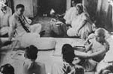 Gandhiji along with S. Shurawarthy, the Prime Minister of Bengal and others at the Beliaghata House, Calcutta in 1947 during the great Calcutta Riots.jpg